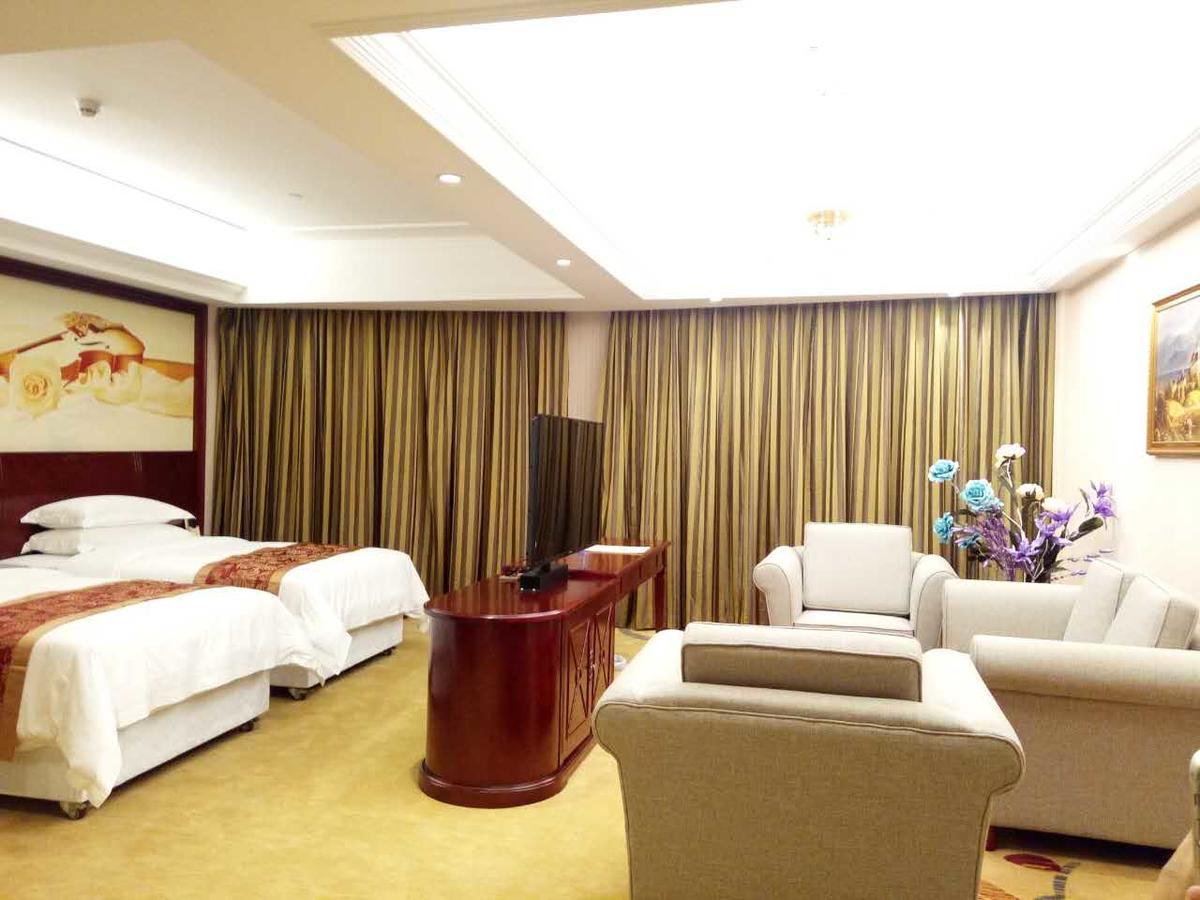 Vienna Hotel Zhongshan Guzhen Town Center Bagian luar foto