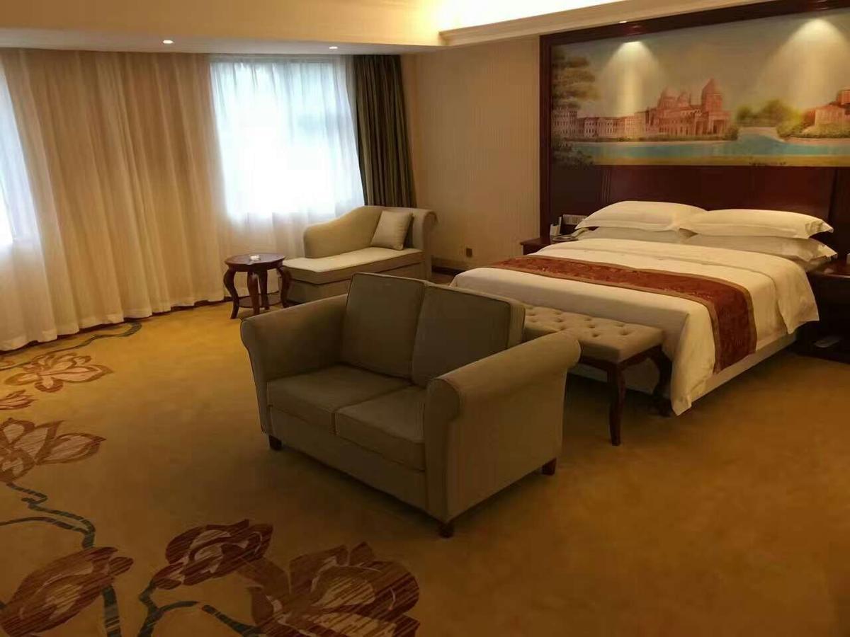 Vienna Hotel Zhongshan Guzhen Town Center Bagian luar foto