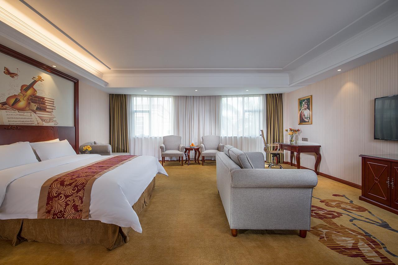Vienna Hotel Zhongshan Guzhen Town Center Bagian luar foto